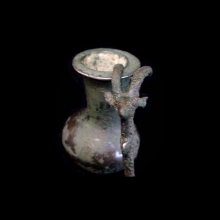 a-bactrian-bronze-kohl-vessel-with-bronze-applicator-cast-in-the-form-of-a-caprid_x641c