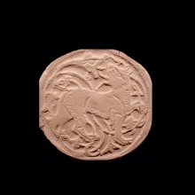 a-beautiful-early-islamic-clay-seal,-depicting-a-lion-and-serpent-in-combat_09661c