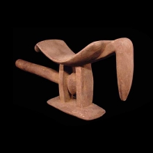 a-beautiful-senufo-wooden-neckrest-in-the-form-of-a-stylized-bird_t5455a