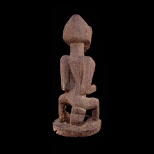 a-dogon-wooden-male-figure-with-powerful-form_t5696c
