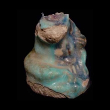 a-fragmentary-glazed-faience-figurine-of-harpocrates,-the-infant-horus_a5755b