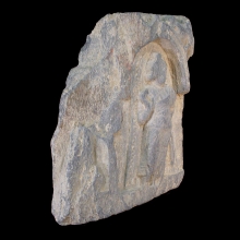 a-gandharan-grey-schist-fragment-depicting-a-figure-standing-within-a-naiskos_x5858c