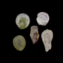 a-group-of-5-(five)-early-islamic-glass-vessel-stamps_08539c