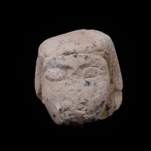 a-limestone-canopic-jar-lid-in-the-form-of-imsety_00914a