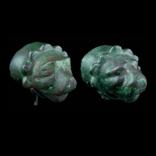 a-pair-of-south-arabian-bronze-lion-head-protome_x8807b