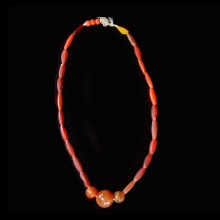 a-strand-of-old-glass-trade-beads-with-beautiful-orange_t6180a