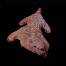 an-ancient-sub-saharan-terracotta-figure-of-a-reptile_a1648a4