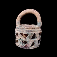 an-early-islamic-green-glazed-ceramic-vessel-with-openwork,-in-the-form-of-a-basket_08607b