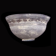 an-indo-iranian-pottery-vessel-with-geometric-motif-on-exterior-in-a-black-pigment_x1083b