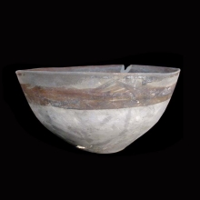 an-indo-iranian-pottery-vessel-with-painted-bands-around-rim-in-a-brown-pigment_x1029b