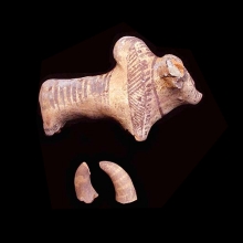 an-indus-valley-painted-clay-figurine-of-a-zebu-bull_x440c