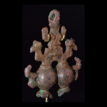 bactrian-bronze-amulet-of-a-stylised-deity_x9370c