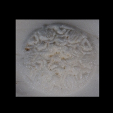 bactrian-steatite-bead-spherical-form-engraved-on-upper-surface-with-rosette_x6669c