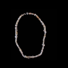 iron-age-fossilized-coral-carved-beads_e3278a