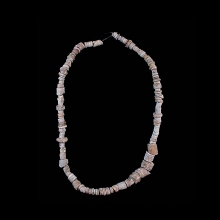 iron-age-fossilized-coral-carved-beads_e3279a