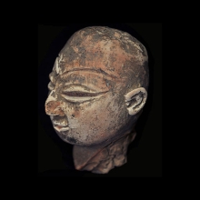 mehrgarh-clay-head-of-a-god_x6143b
